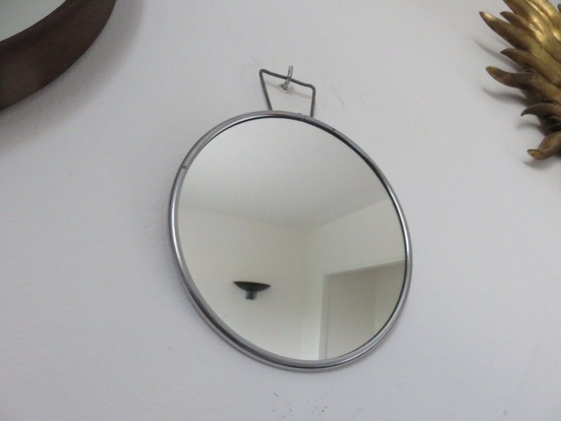 Wall-mounted round barber mirror 50s 60s
