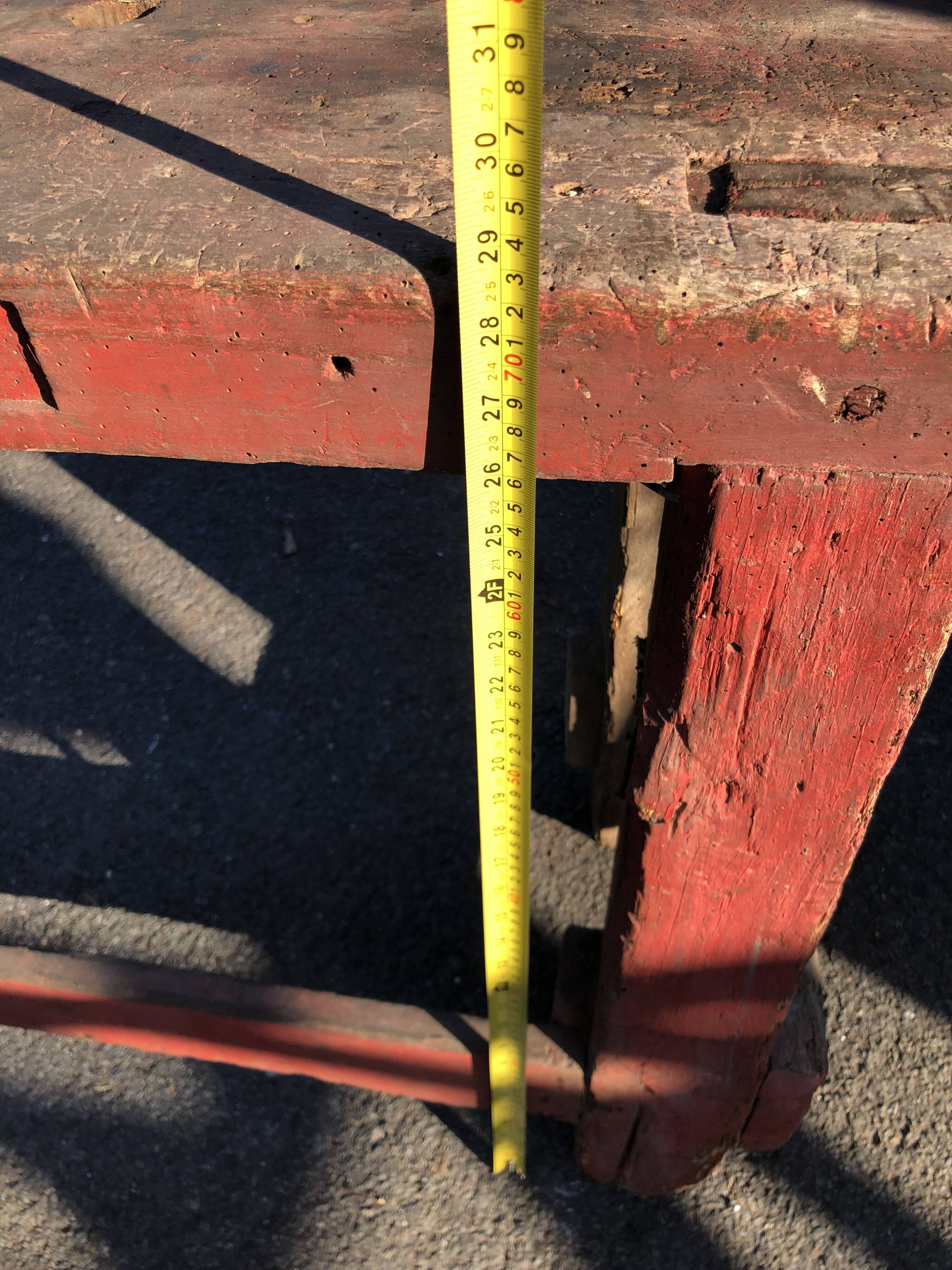 Old carpenter's workbench painted red