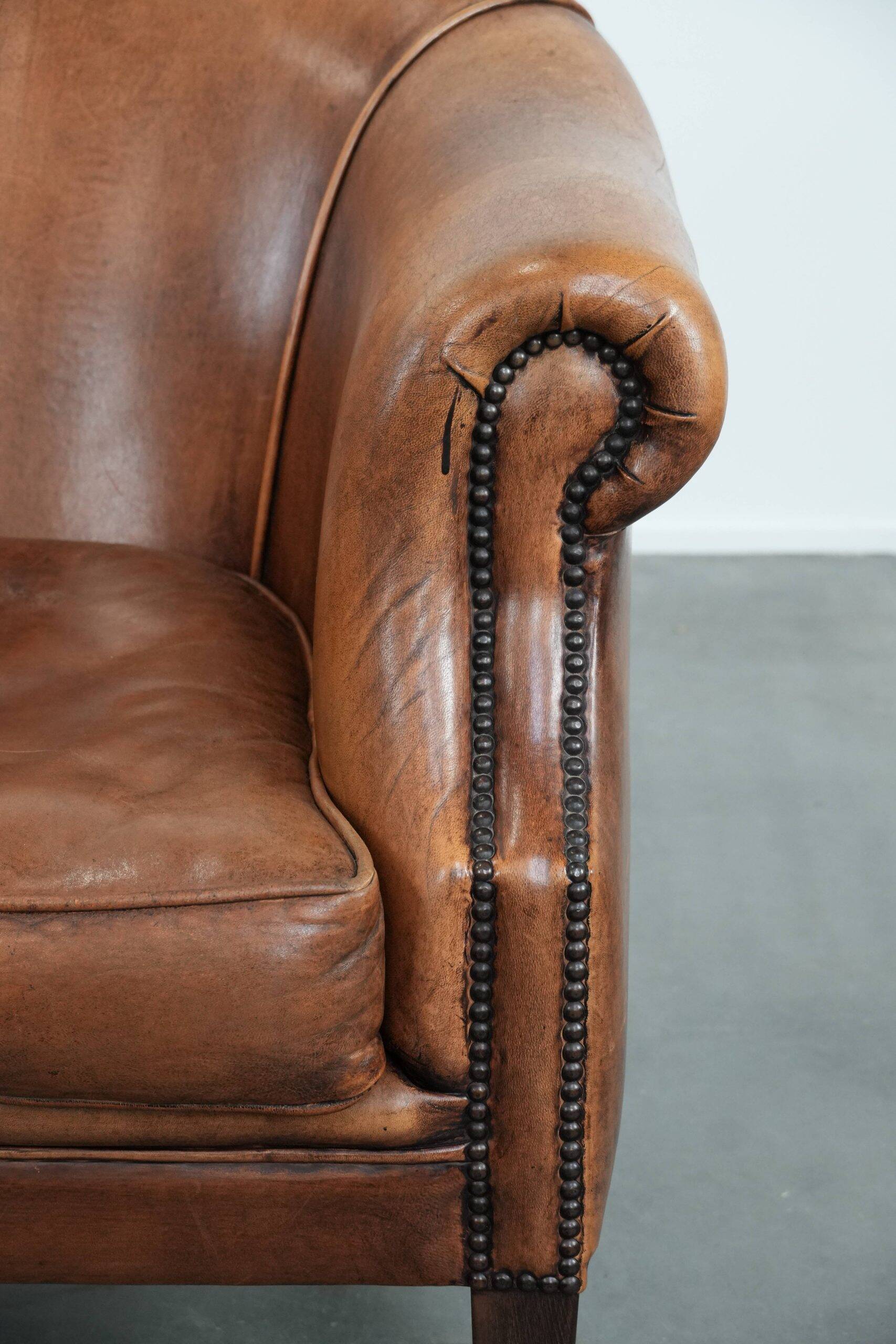 Sheepskin leather club chair with beautiful colours and comfortable seat