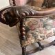 Antique armchair in Henri II style with masks