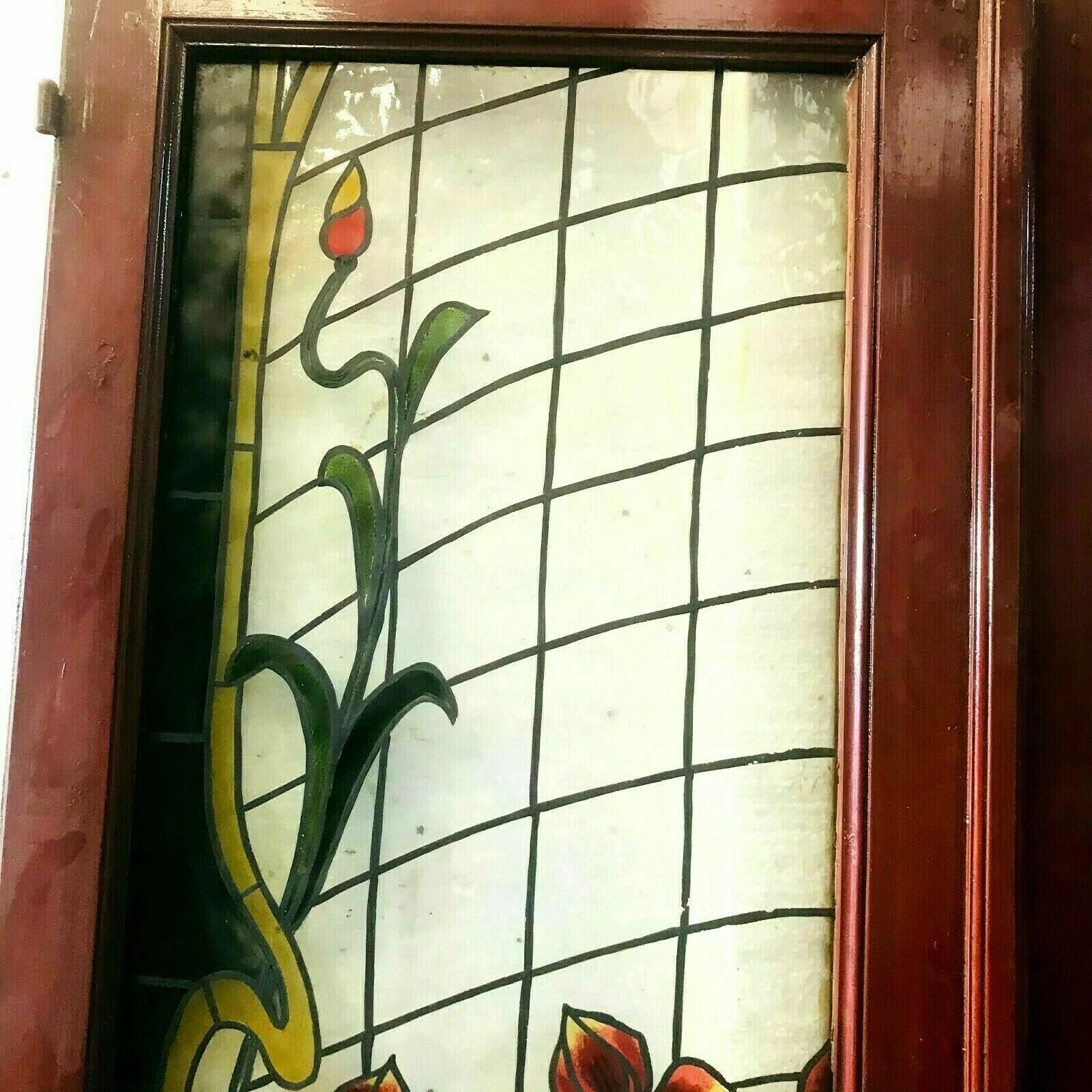 Pair of art deco doors in glass painted in imitation of 20th century stained glass