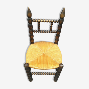 Chaise en bois perlé