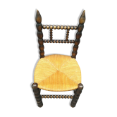 Beaded wooden chair