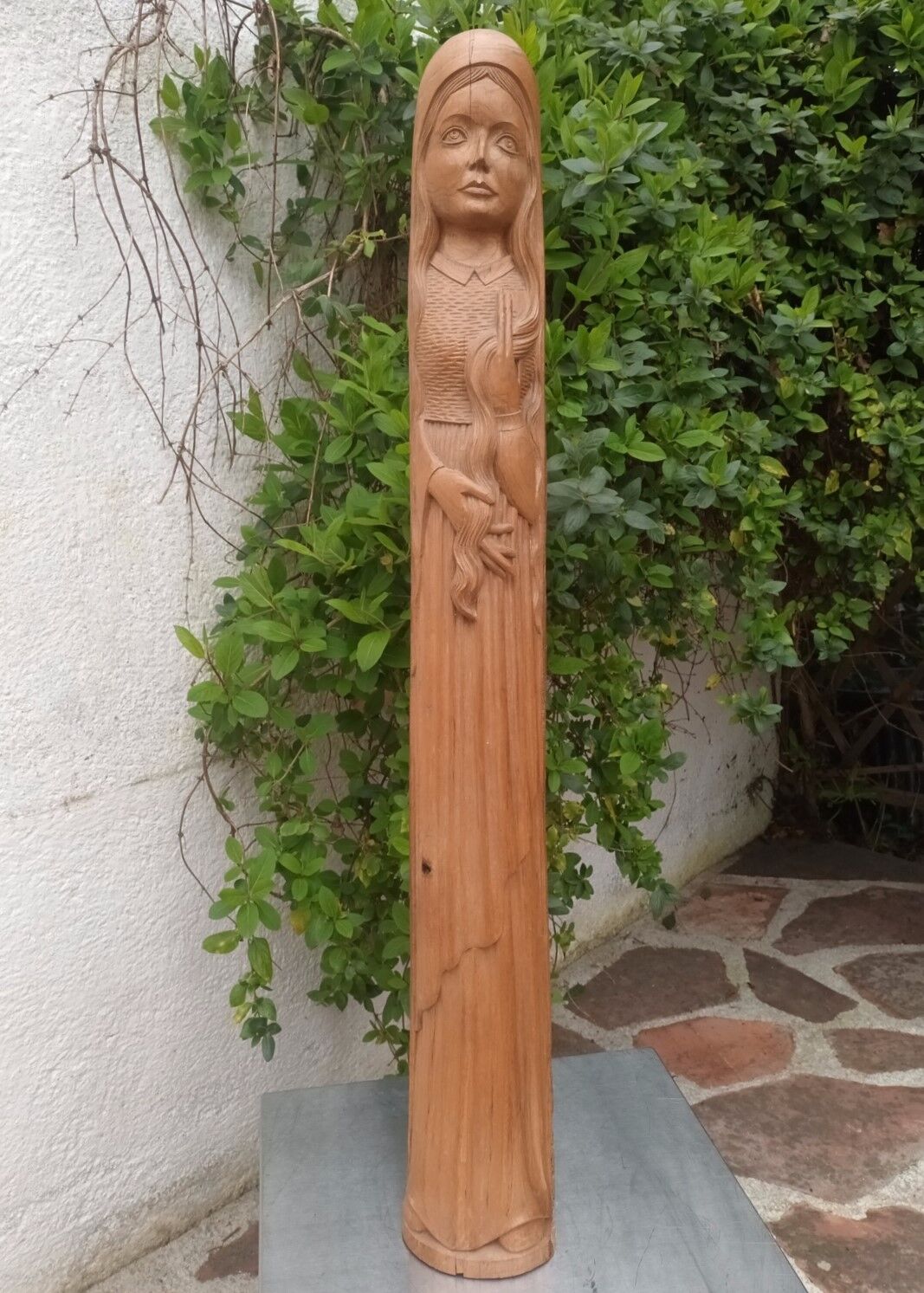 Young woman sculpture by Ray Boterf