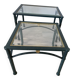 2 nesting tables from the 1960s in metal and bevelled glass.