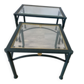 2 nesting tables from the 1960s in metal and bevelled glass.