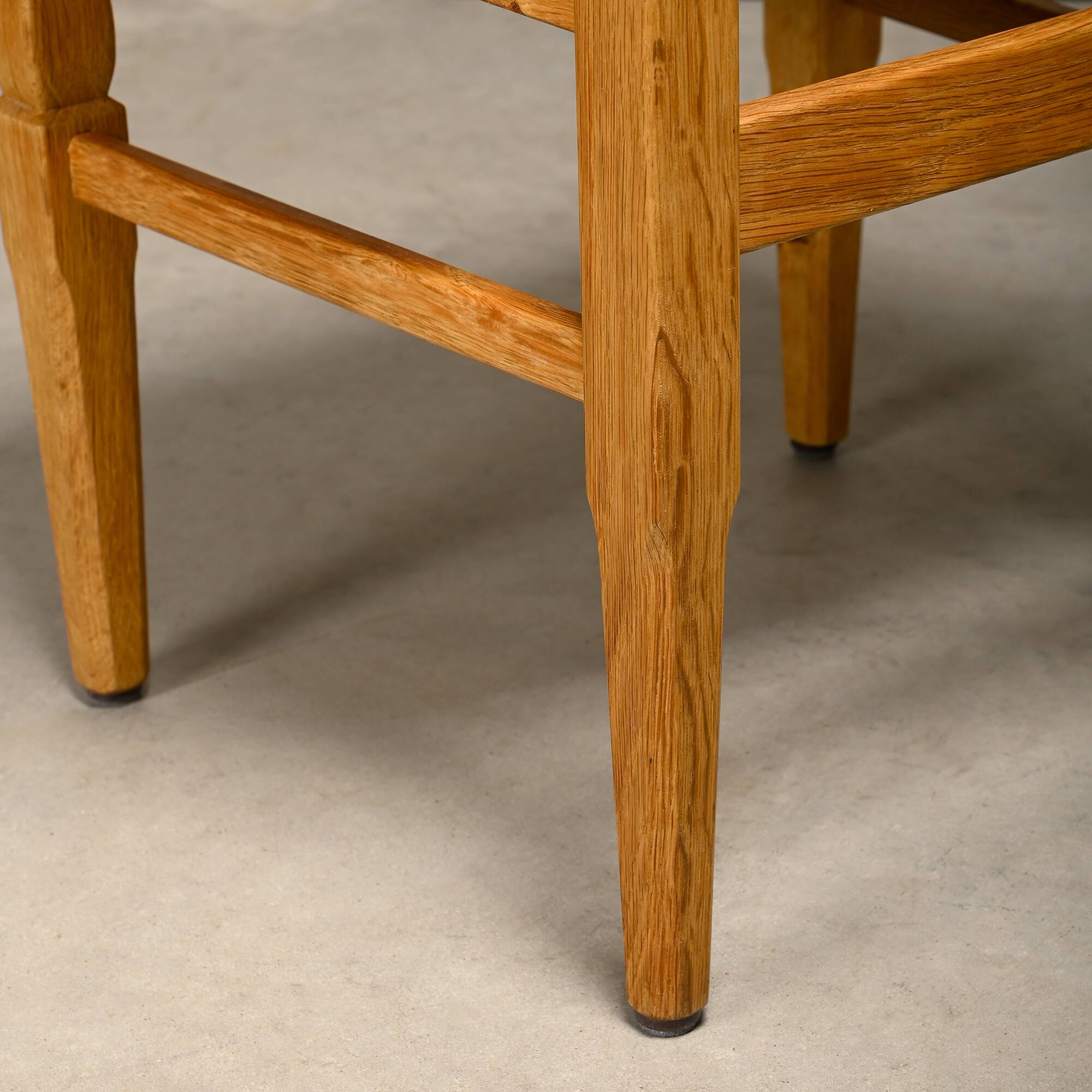 Henning Kjærnulf dining chairs set in Oak and Sheepskin, Denmark, 1960s
