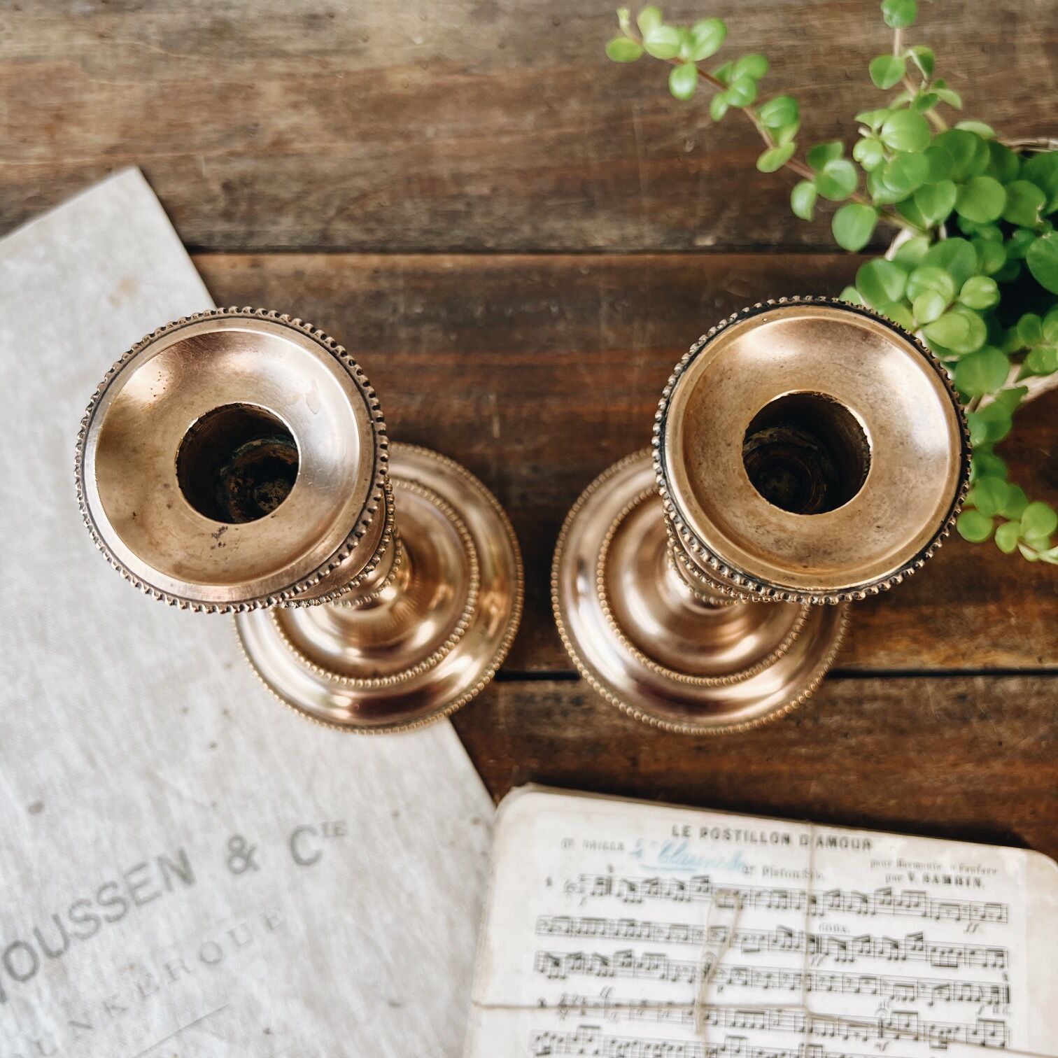 Duo of brass candle holders