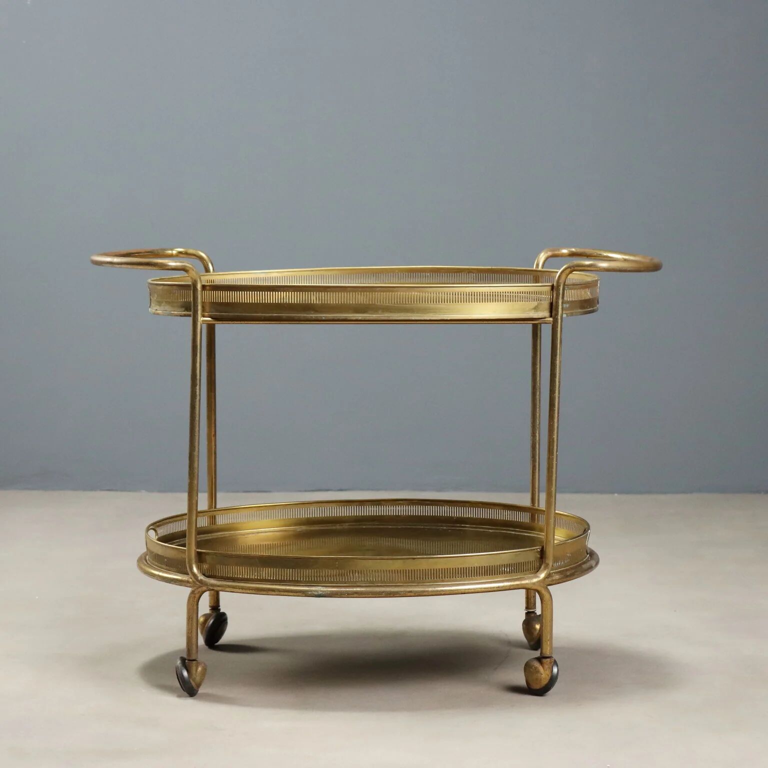 Vintage double-tier brass serving trolley, 1950s design.