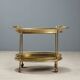 Vintage double-tier brass serving trolley, 1950s design.