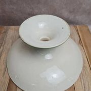 Antique compote stand Lunéville St Clément with green clover decoration.