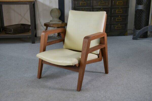 Modernist armchair in mahogany and skai 1940-1950