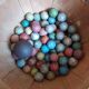 70 terracotta balls and a metal calot