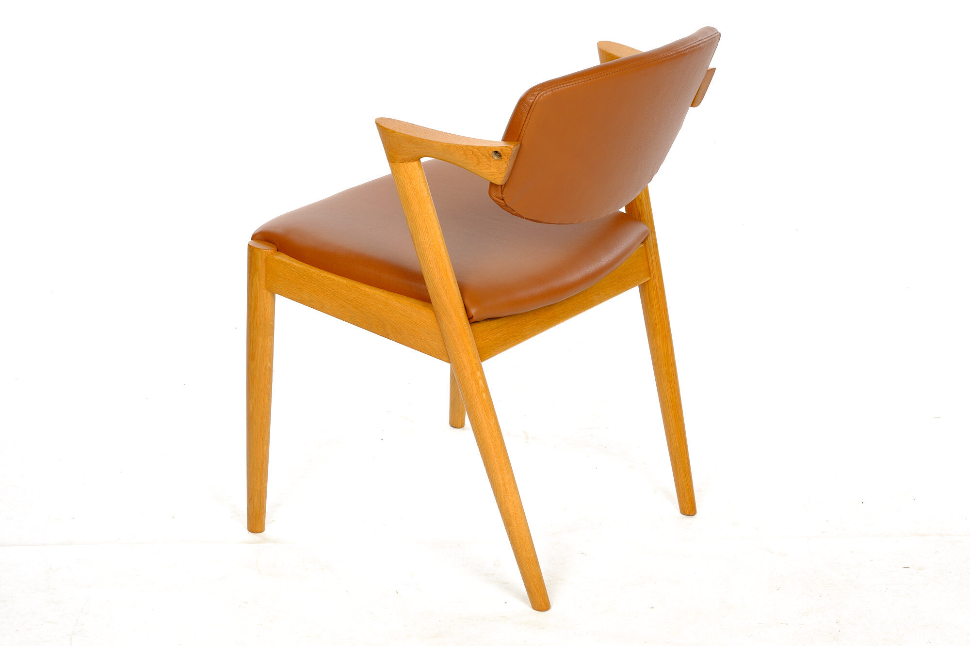 Four Kai Kristiansen oak chairs with new leather upholstery