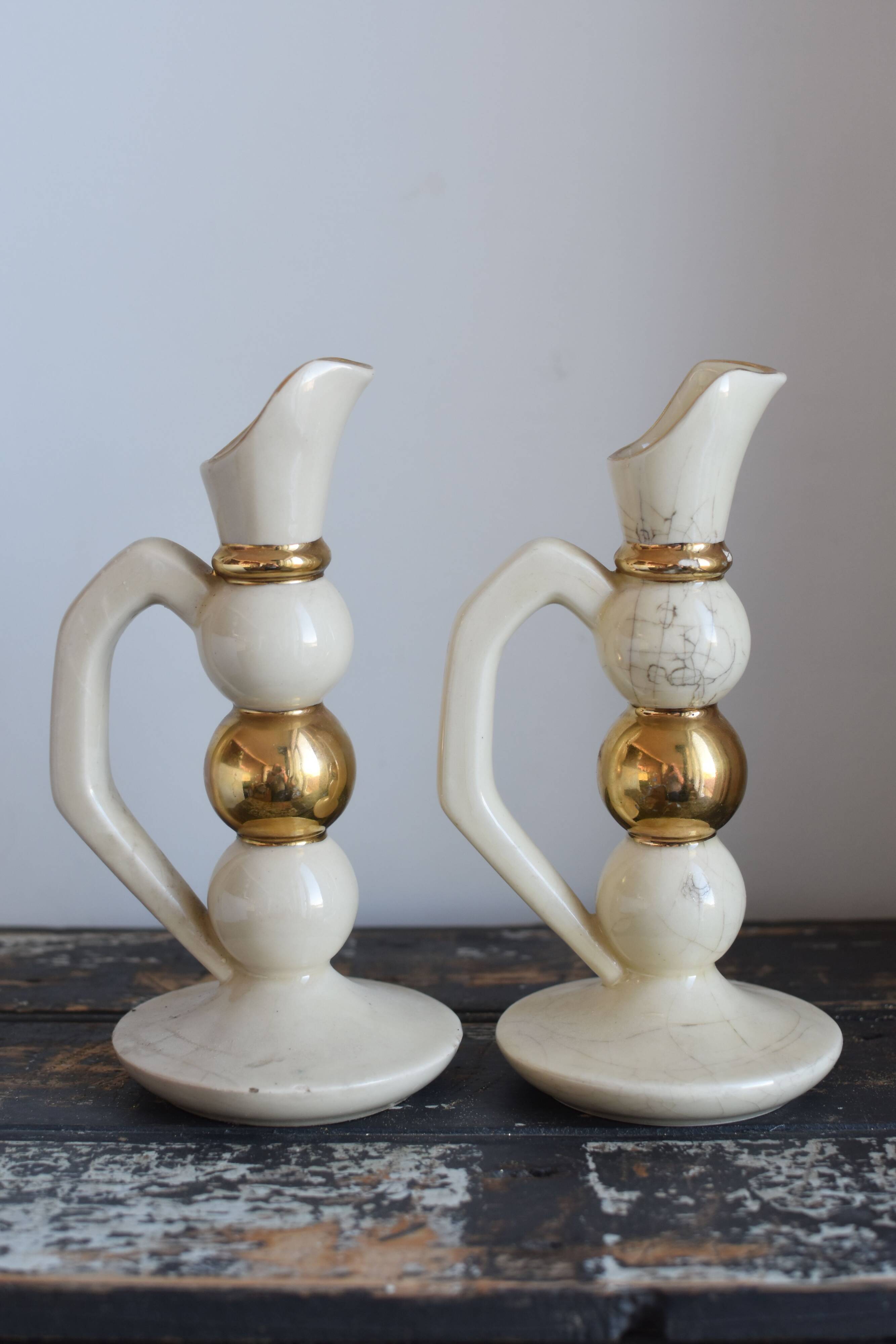 Pair of designer candle holders