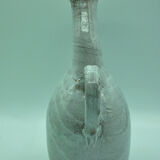 Pitcher at the leaning collar in snarl