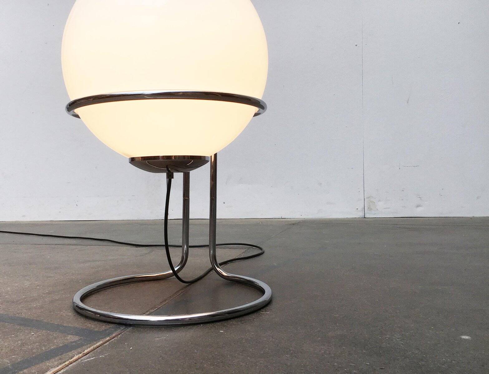 Vintage globe floor lamp in glass and chrome from the space age.