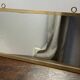 Grand miroir vintage en laiton
