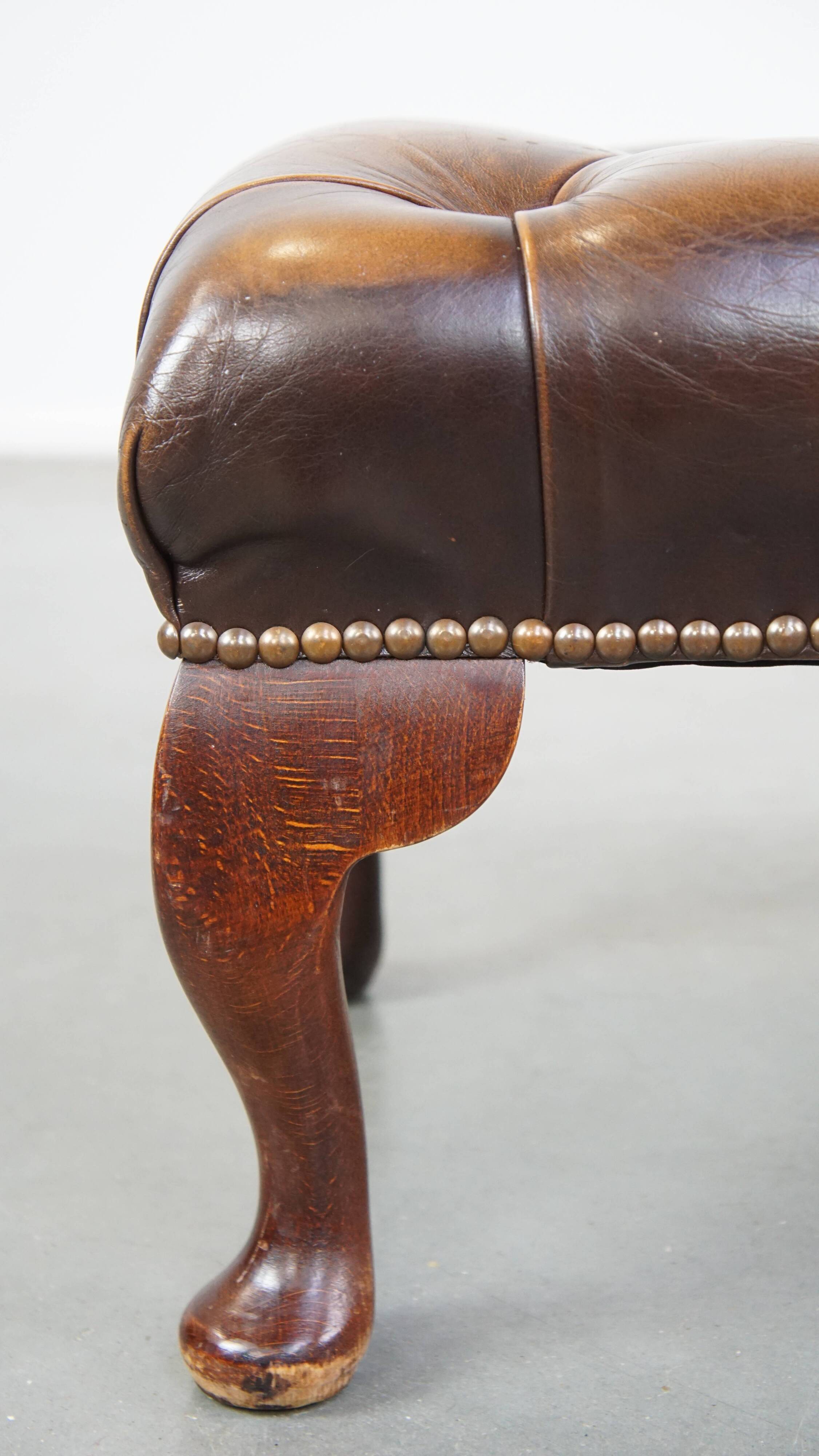 Brown cow leather chesterfield footstool