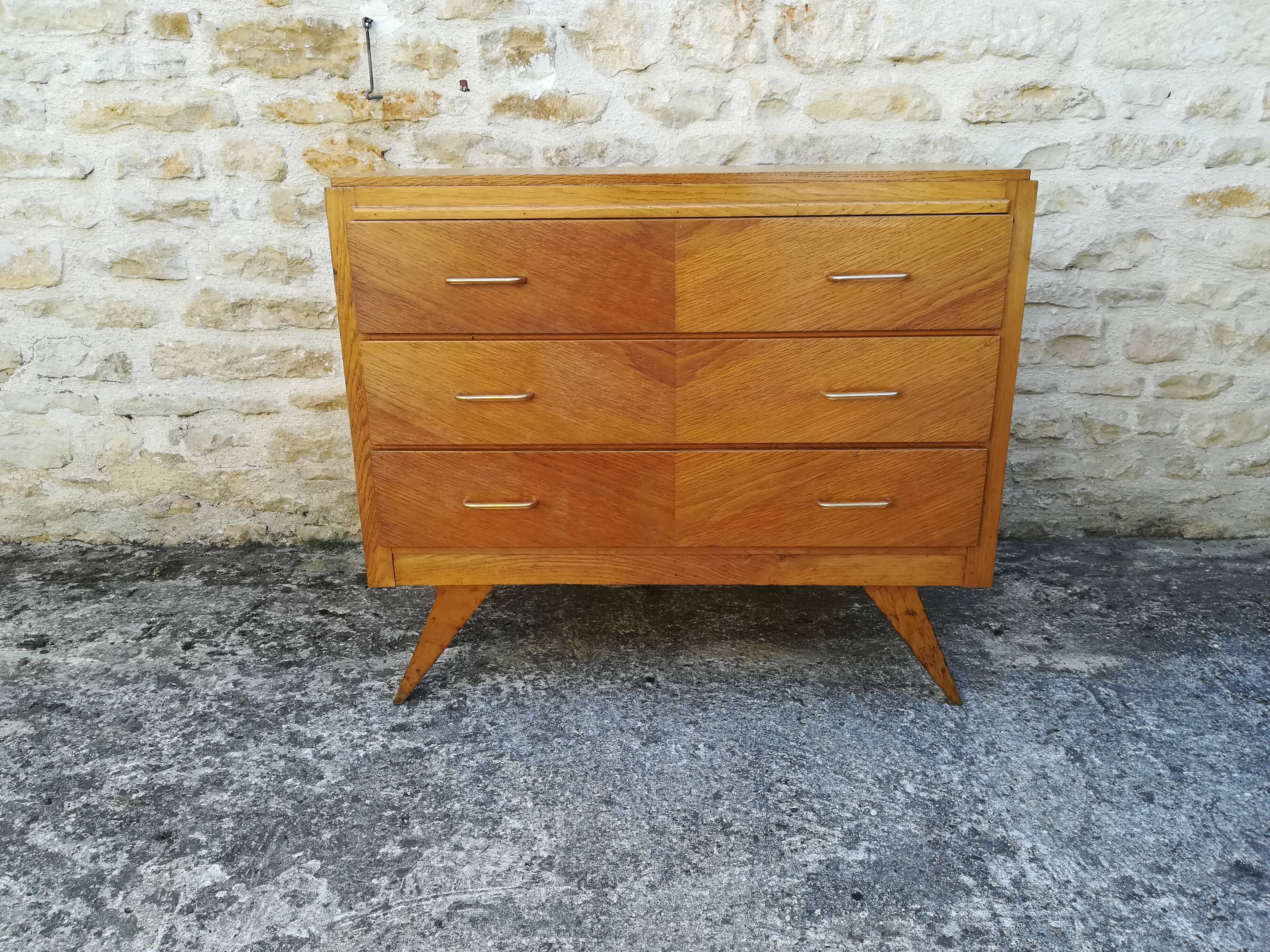 Compass feet chest of drawers