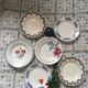 Six soup plates don't match in red and blue
