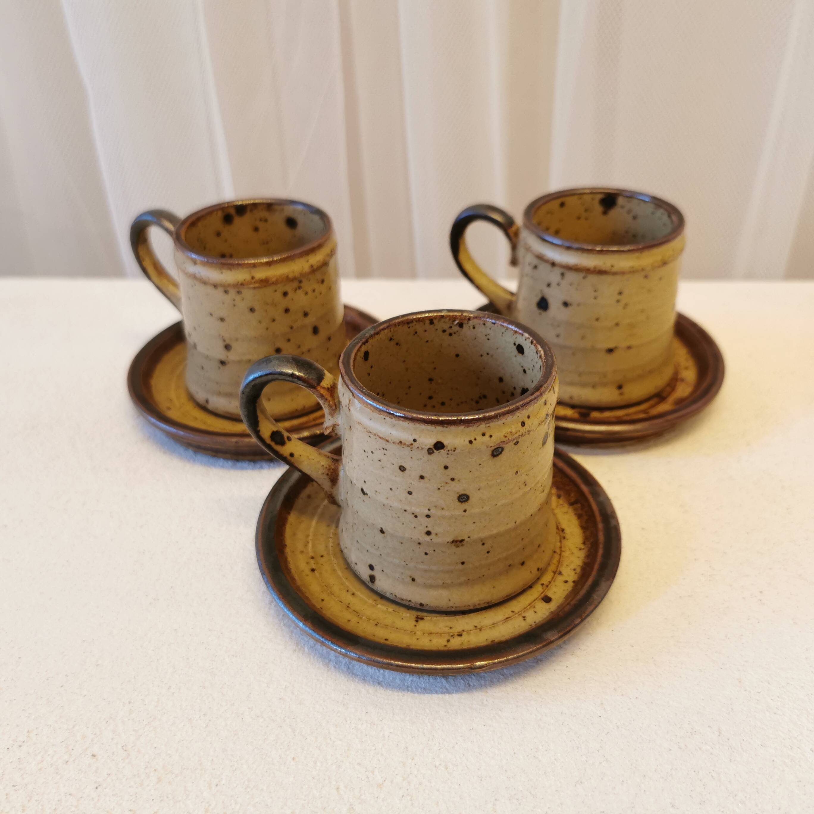 Set of 3 coffee cups and saucers