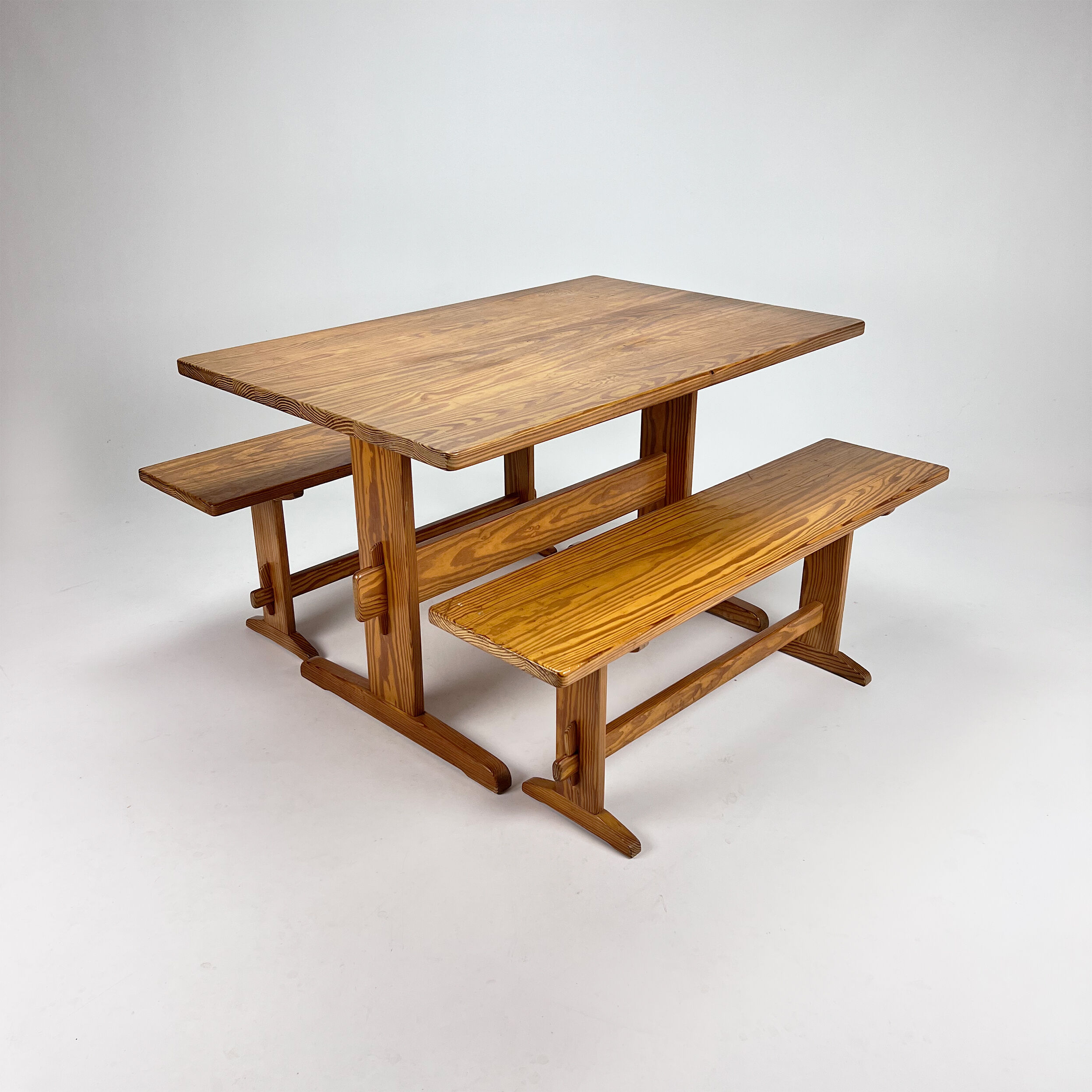 Mid century scandinavian pine dining set consists of one table and two benches, 1960s