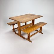 Mid century scandinavian pine dining set consists of one table and two benches, 1960s