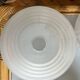Translucent glass saucer suspension