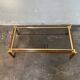 Gold metal coffee table with elm burl imitation.