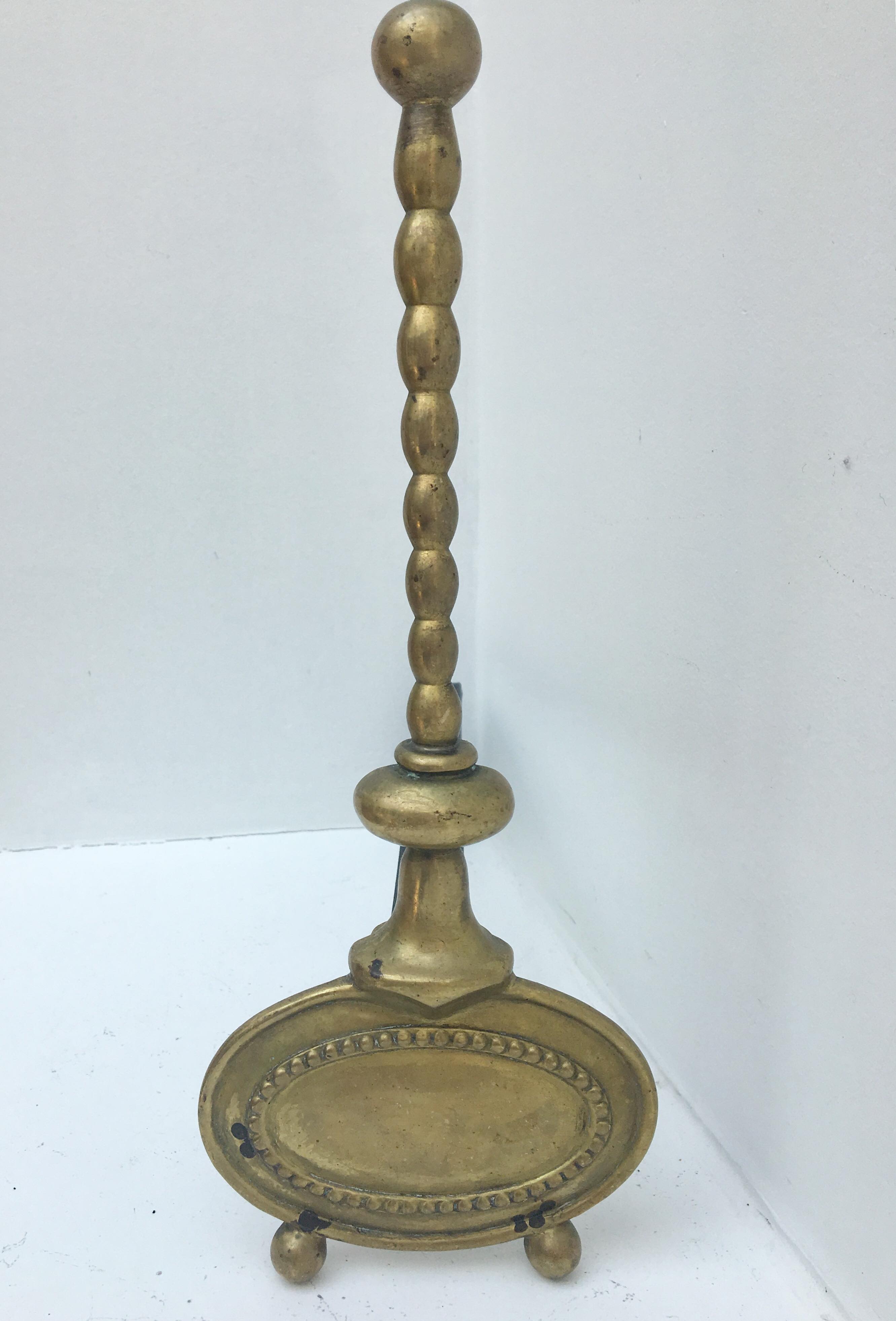 Pair of andirons in brass for fireplace