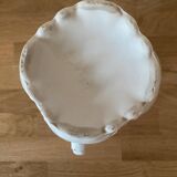 Old ceramic pitcher decorated with flowers