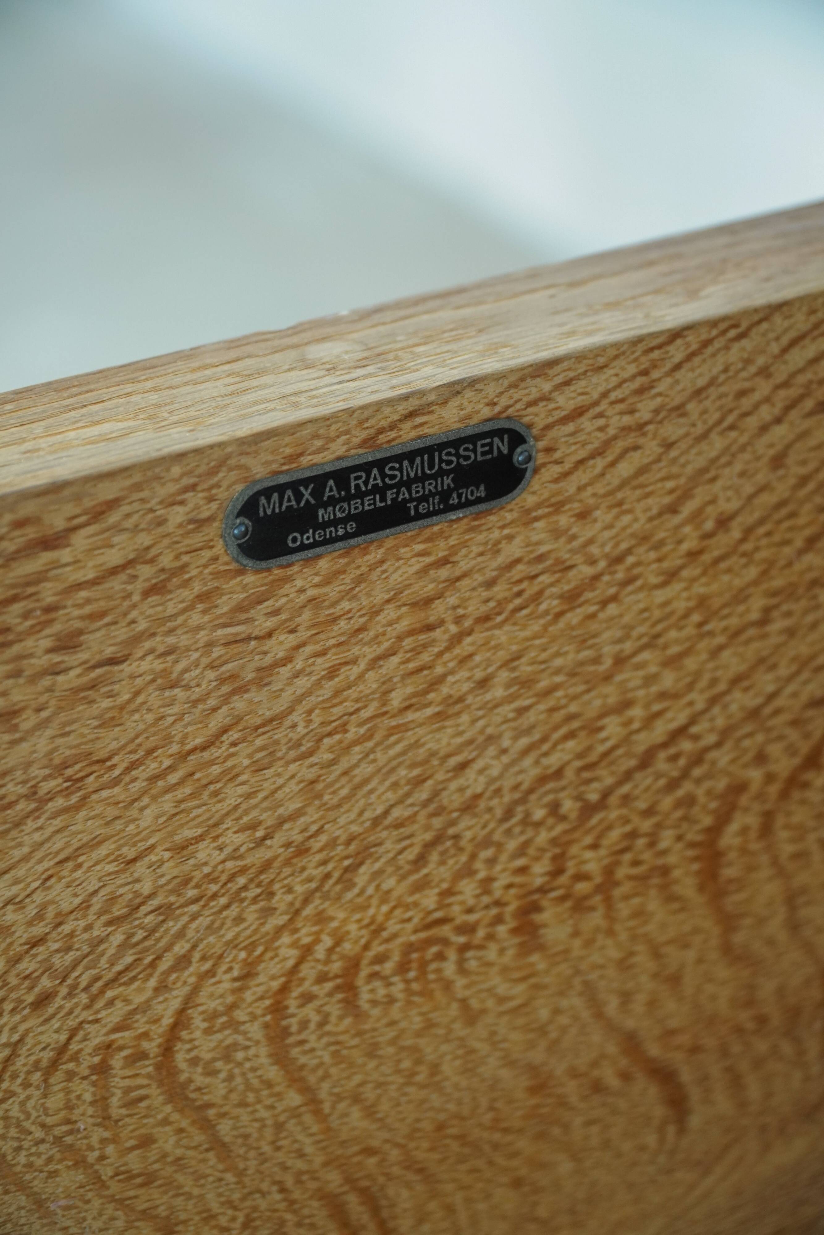 Modern Danish buffet in carved oak, signed Max A. Rasmussen, Denmark, 1940s.