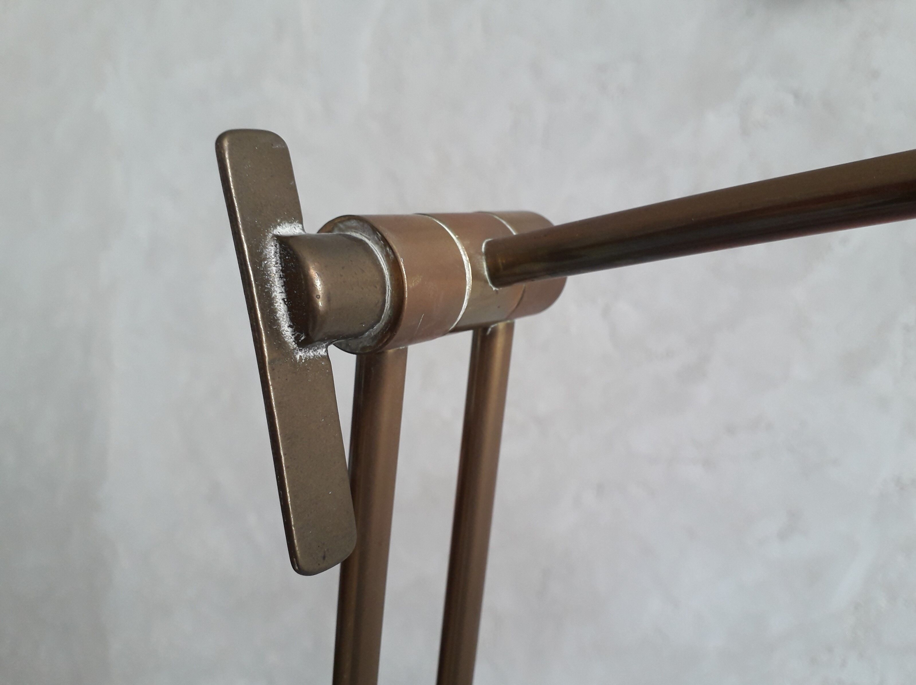 Articulated brass floor lamp