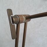 Articulated brass floor lamp