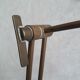 Articulated brass floor lamp