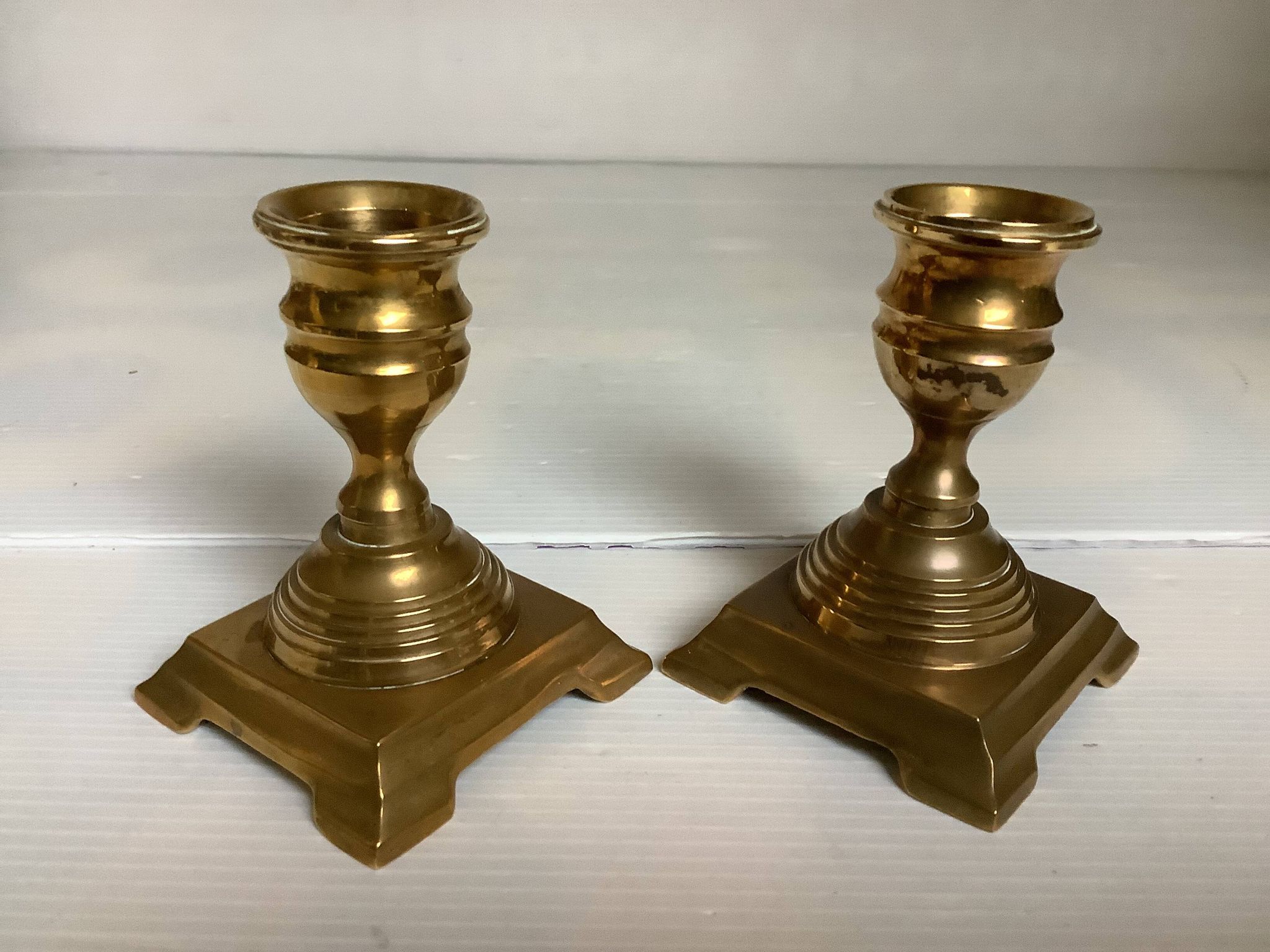 Pair of small brass candle holders