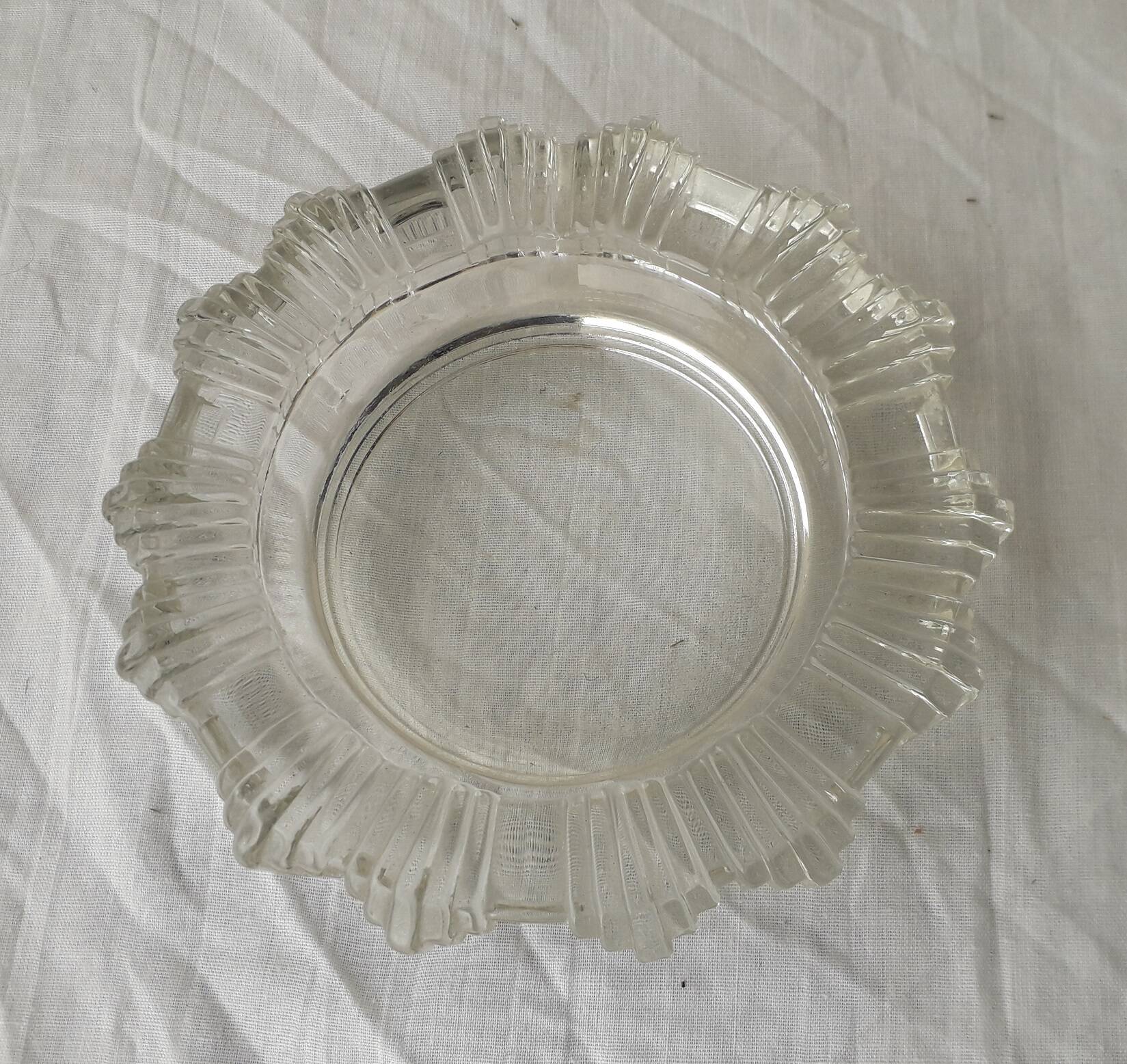 Ashtray or glass catchall.