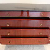 Mahogany “swan neck” chest of drawers, Empire style, 19th century.
