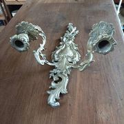 Cast iron wall candle holder with patinated gold metal