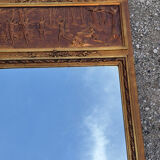 Golden trumeau mirror in Louis XVI style, 20th century.