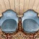 Paire de fauteuils bergères de style Louis XV en velours bleu et bois doré