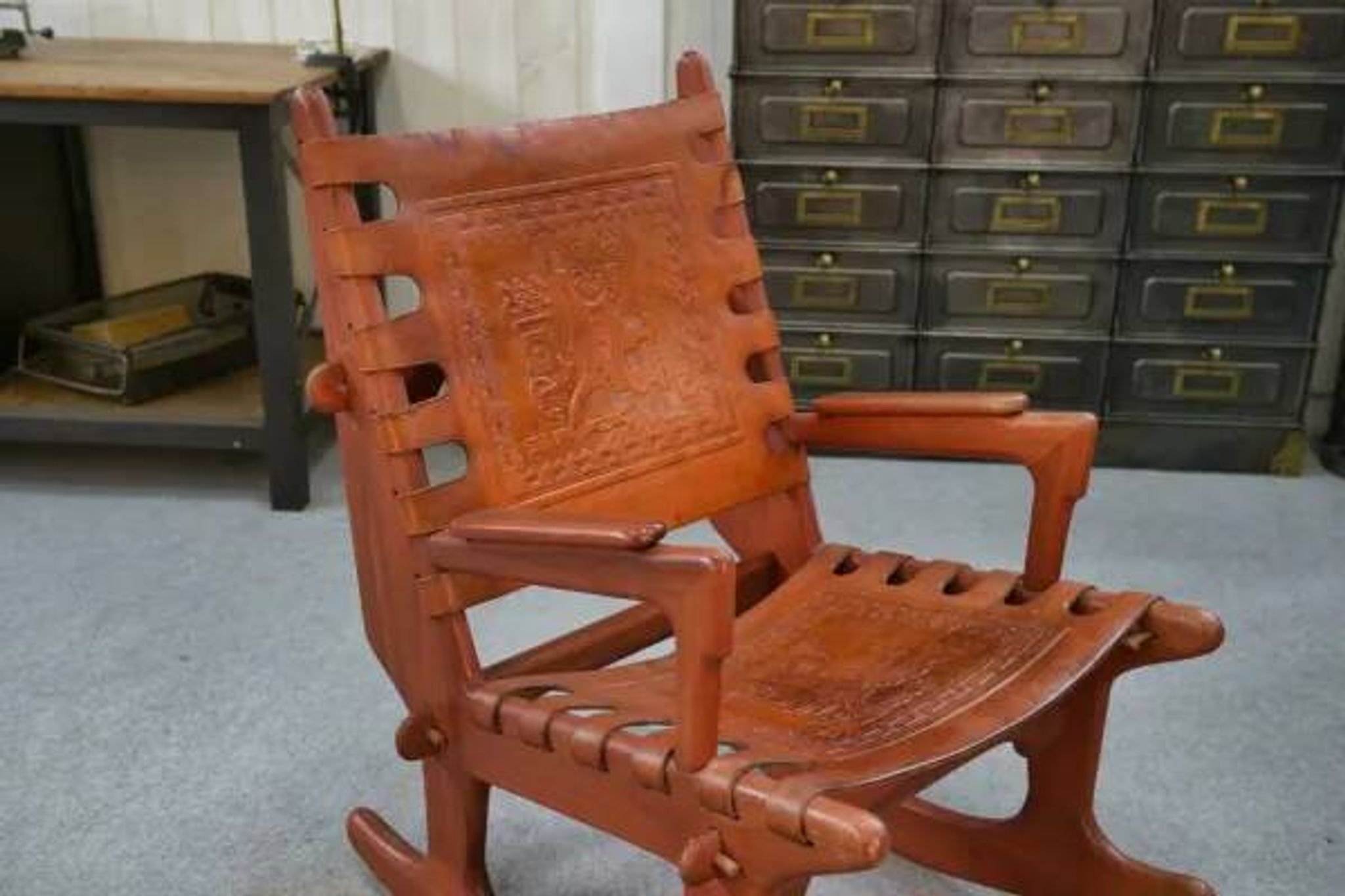 Armchair by Angel Pazmino in wood and red leather 1960's
