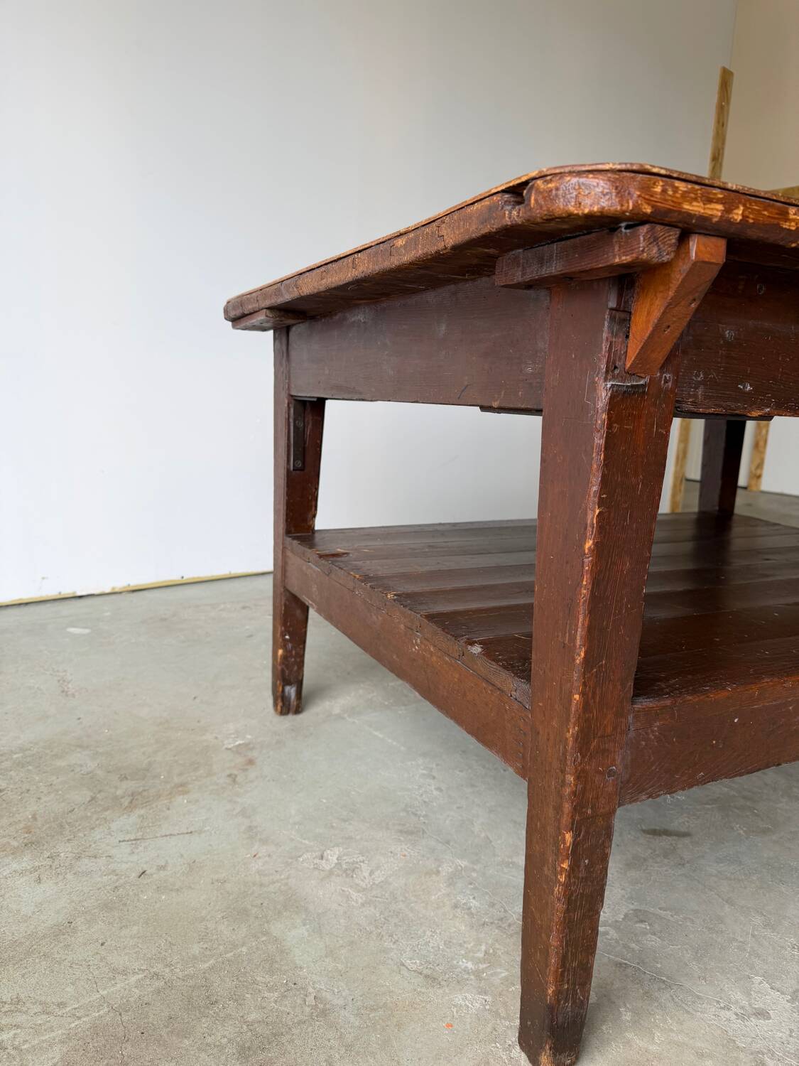 Antique draper's workbench / haberdashery table in solid wood from the early 20th century.