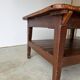 Antique draper's workbench / haberdashery table in solid wood from the early 20th century.