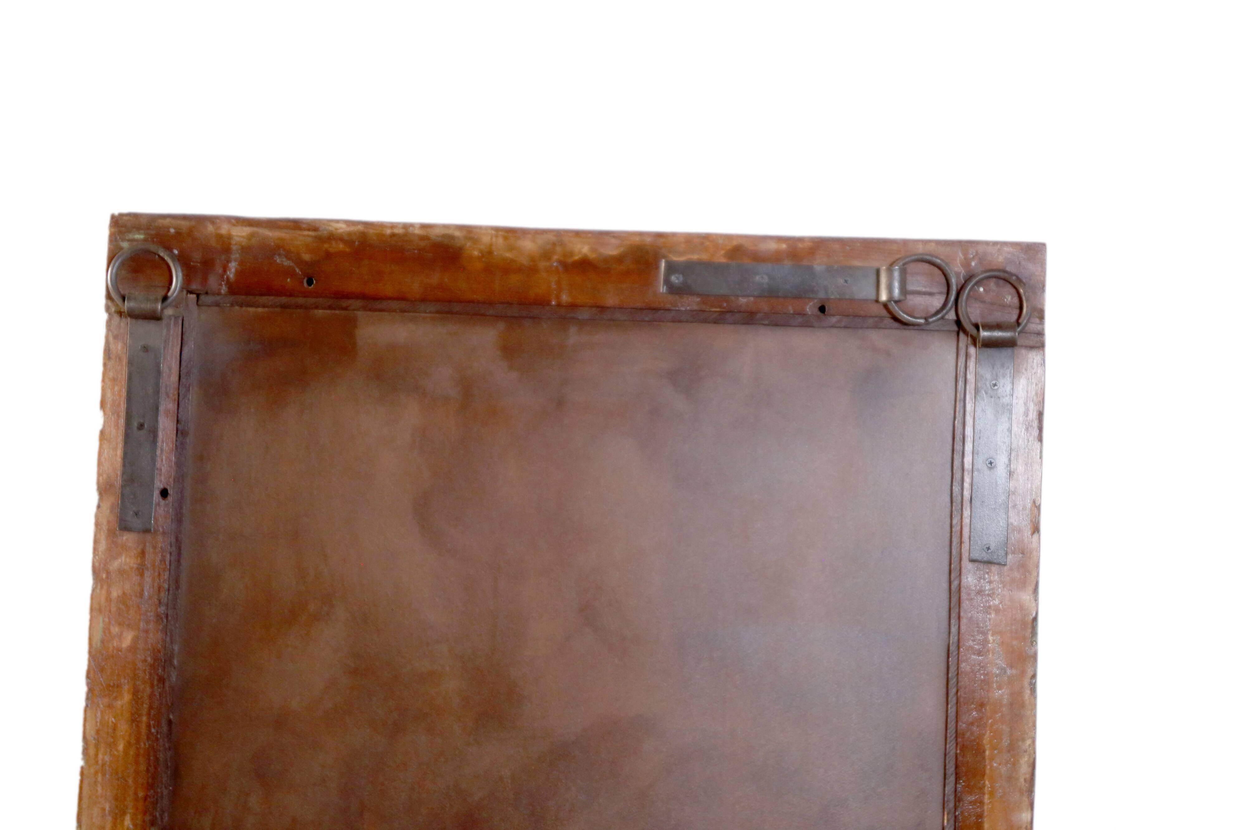 Ancient Burmese teak mirror