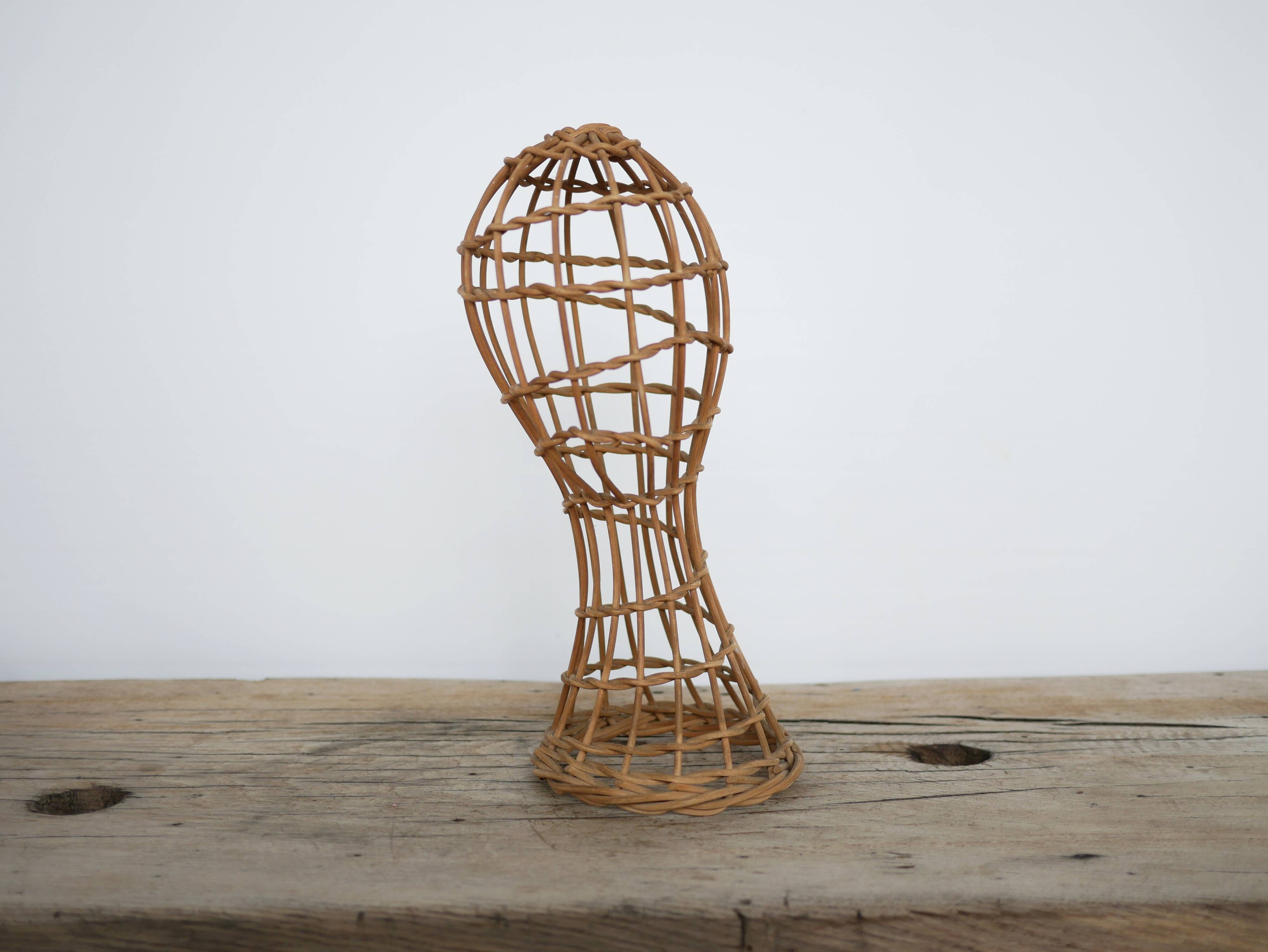 Vintage rattan hat rack