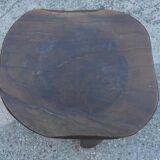 three-legged milking stool made of olive tree folk art