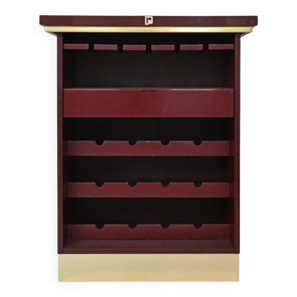 Burgundy lacquered wooden bar cabinet by designer Paco Rabanne.