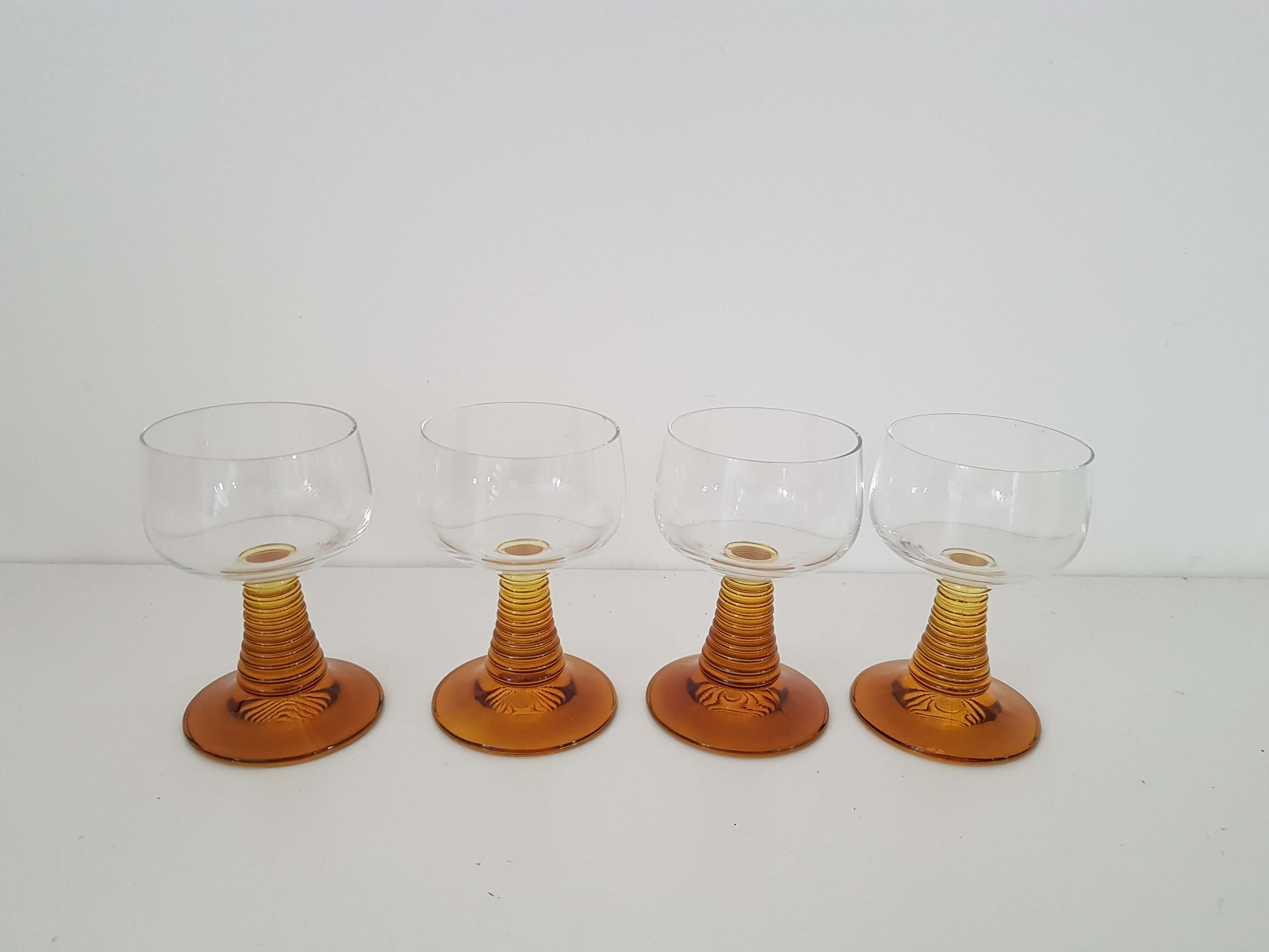 4 vintage foot glasses